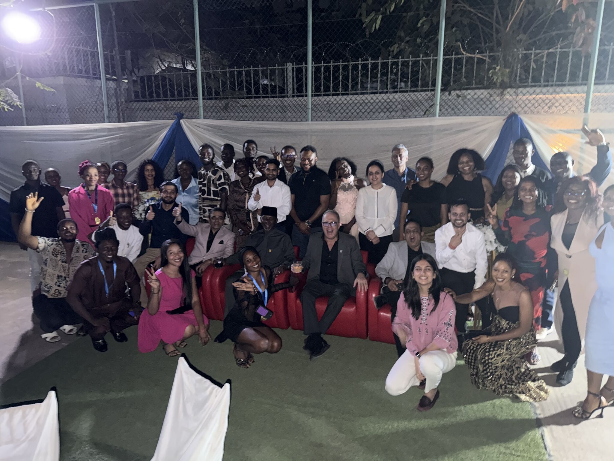 Soumya Goel with the Skipper Eye-Q team at an evening gathering in Nigeria